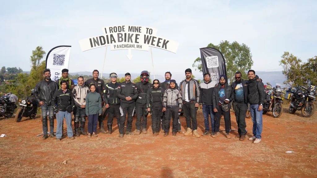 Riders at the I Rode Mine to India Bike Week sign in Panchgani, Maharashtra