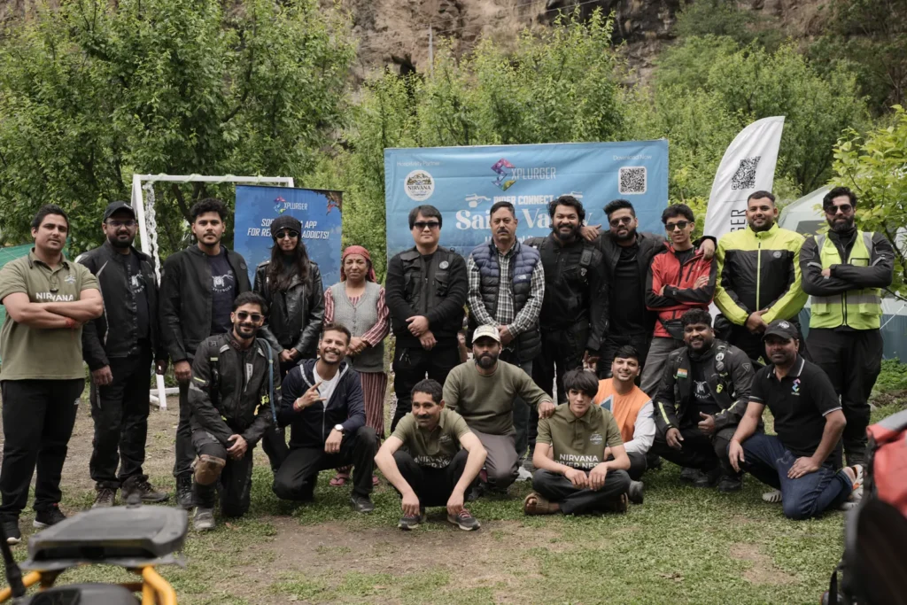 Group photo of riders and hosts at Explurger Rider Connect, Sainj Valley